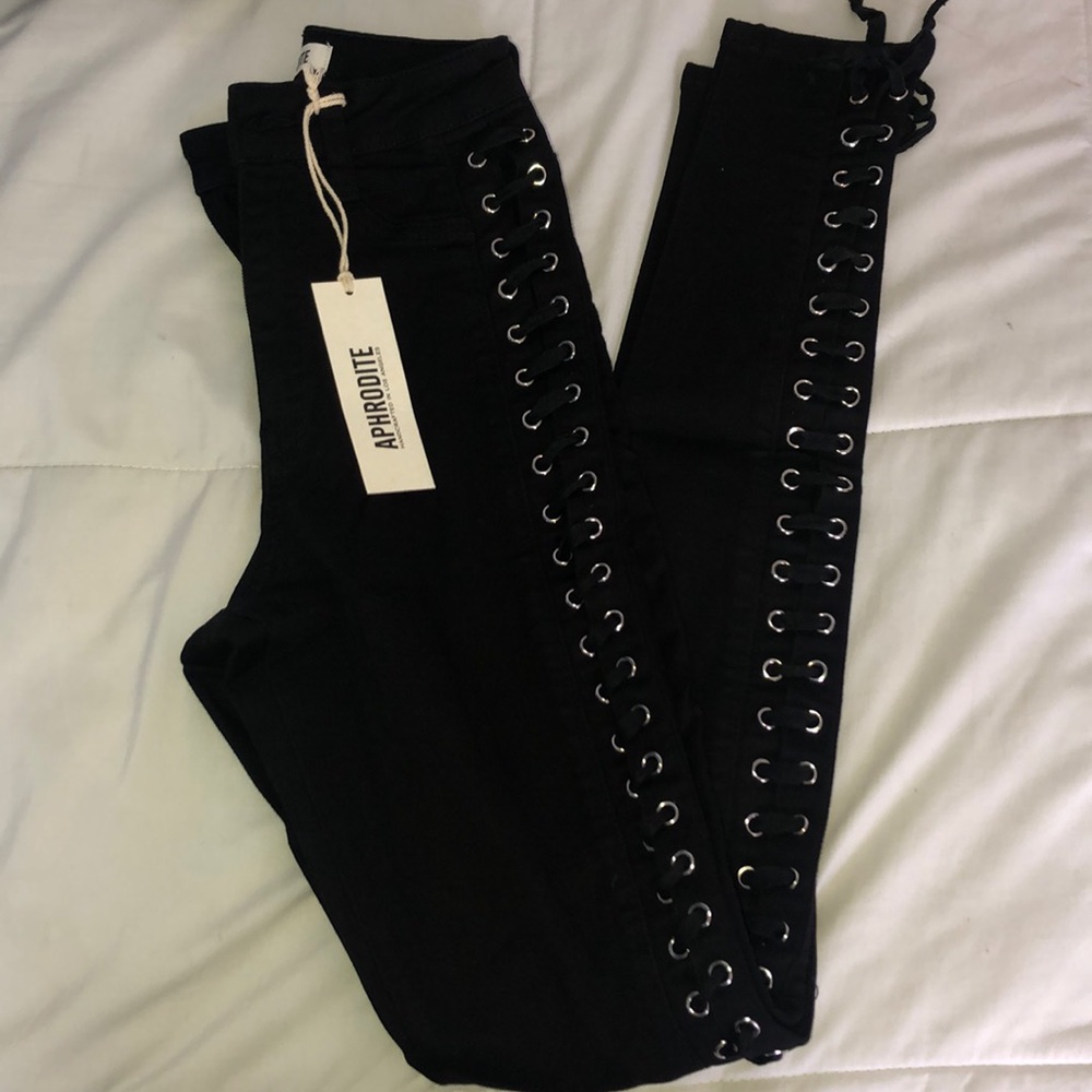 Black high waisted jeans with side tie detail